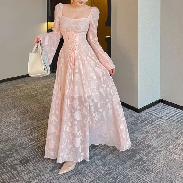 Pink floral dress with trumpet sleeves and V-belt waist