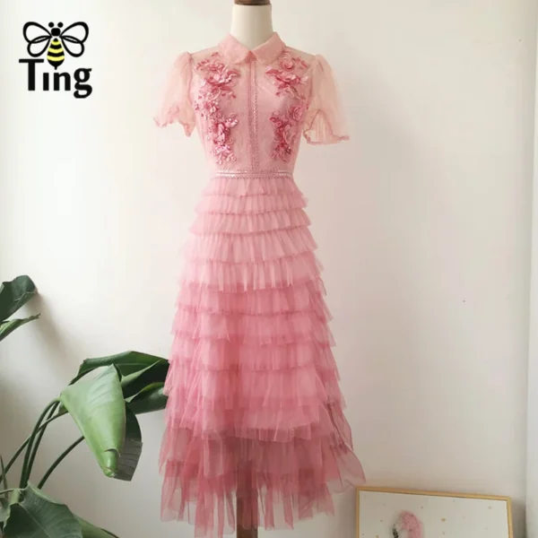 Pink floral dress with ruched lace, glitter, and flower appliques